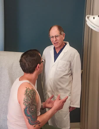 Dr Raskin with patient